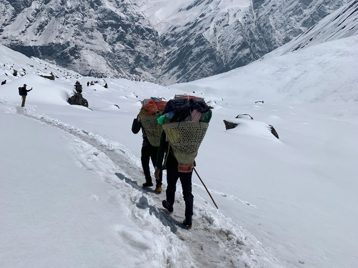 Porter carrying load towards ABC 