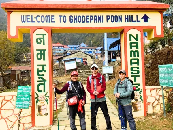 Taking Photo Infront Of Entrance Of Ghorepani